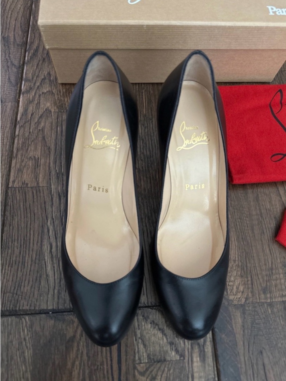 Christian Louboutin Black Leather Round-Toe Pumps